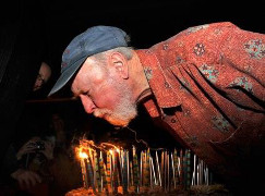 Pete Seeger blowing out birthday candles